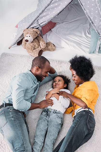 Family Hanging on Floor Enjoying the Heating in Their Home